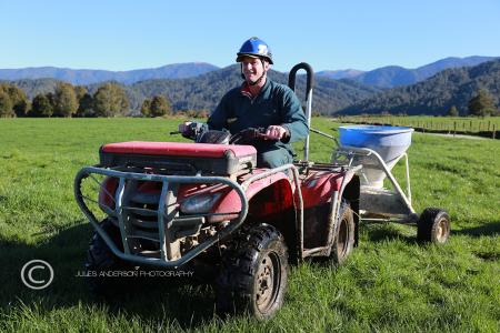[Image] West Coast farmer Colin van der Geest on quad bike.